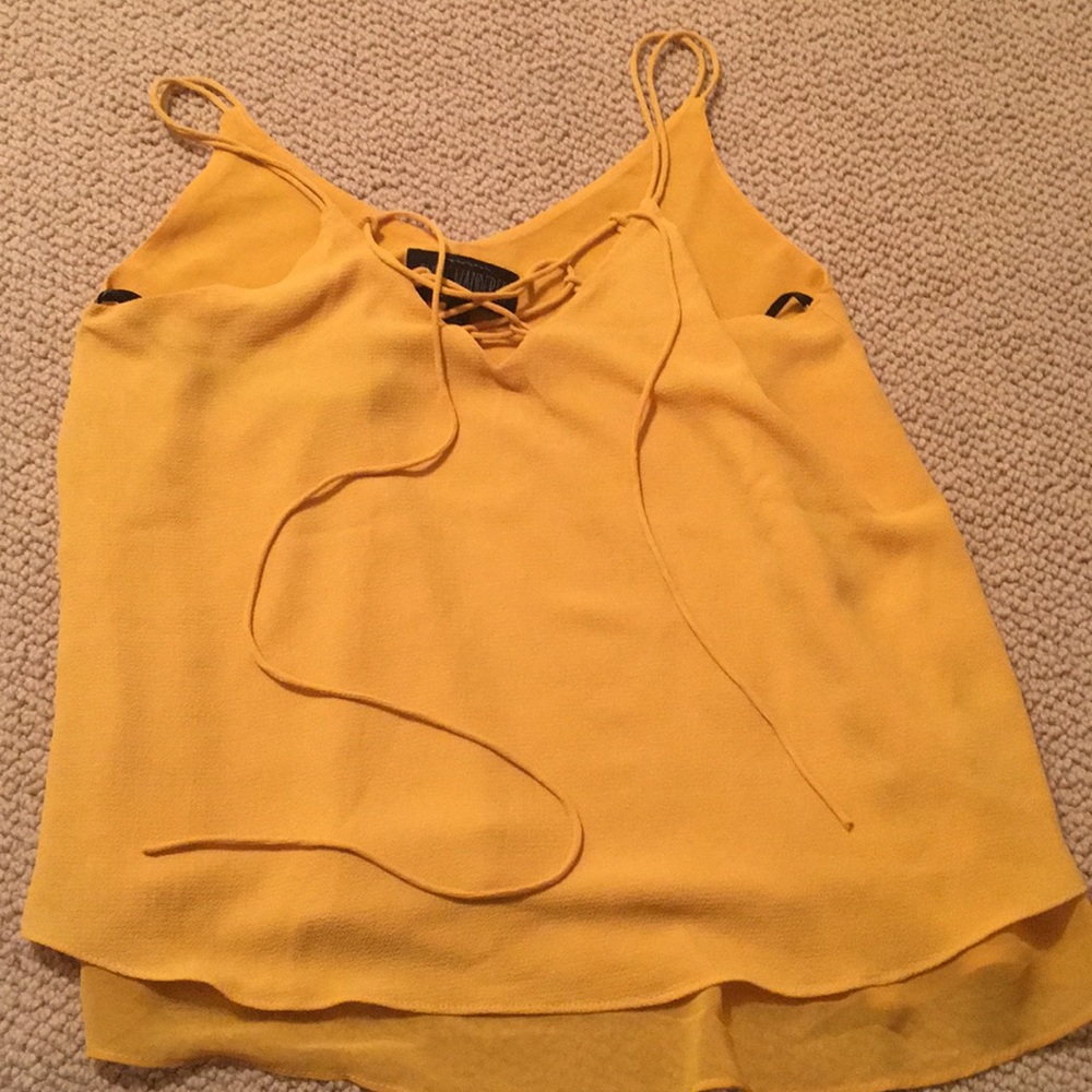 New mustard yellow top size small never worn
