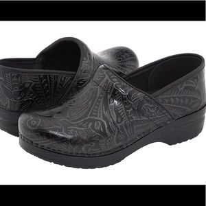 Dansko black leather tooled clogs