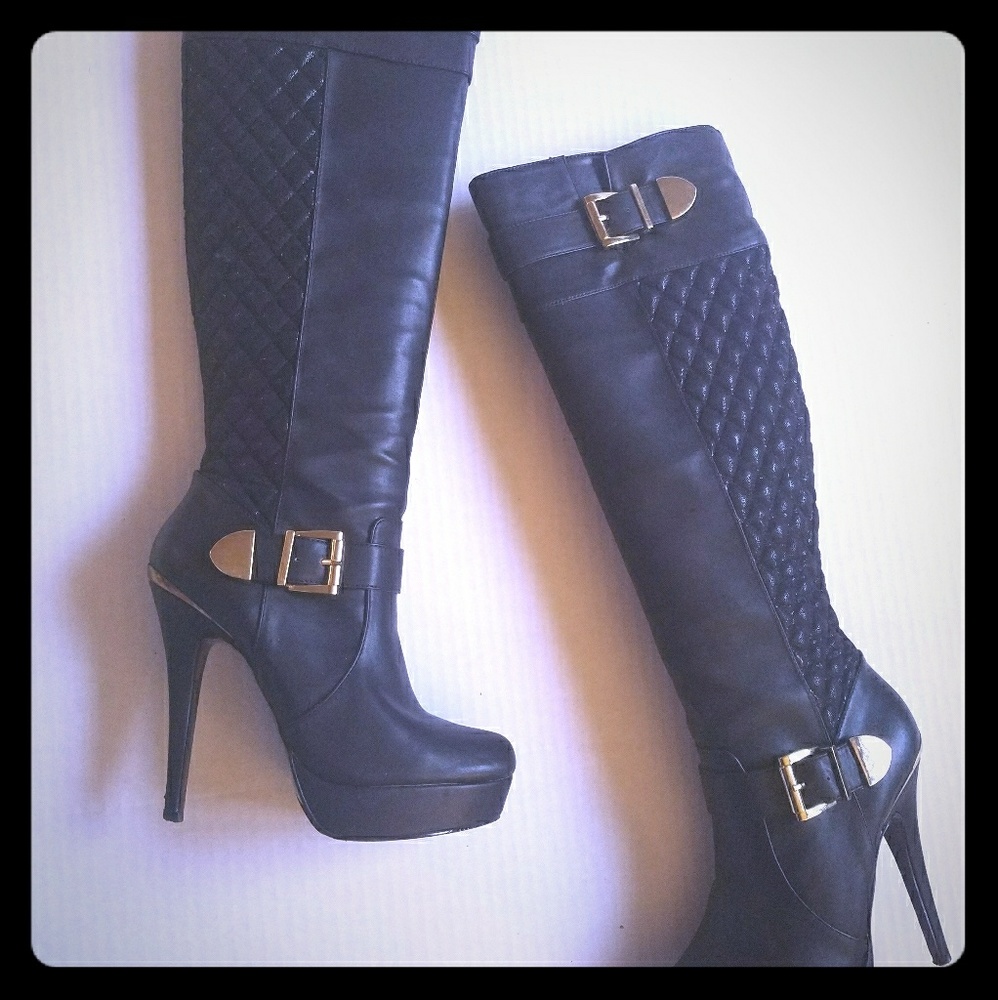 Black quilted platform knee boots with gold detail