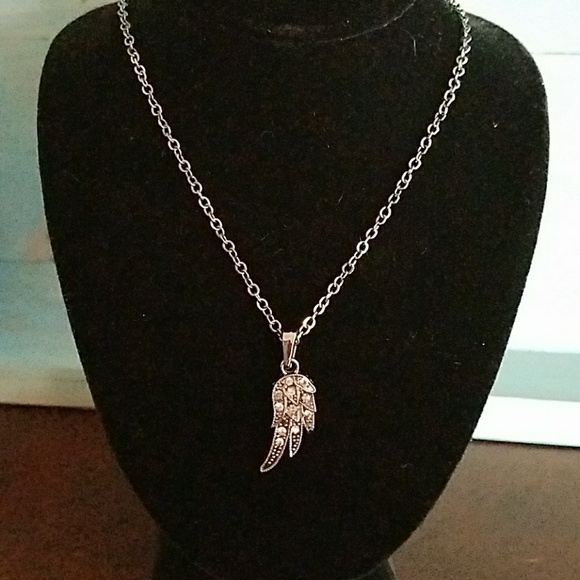 Jewelry - Pewter colored righnstone Angel wing necklace
