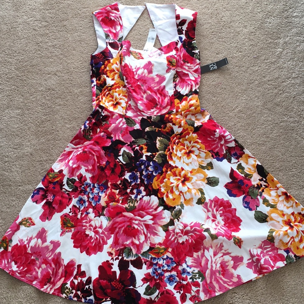 Floral dress with a cute back.