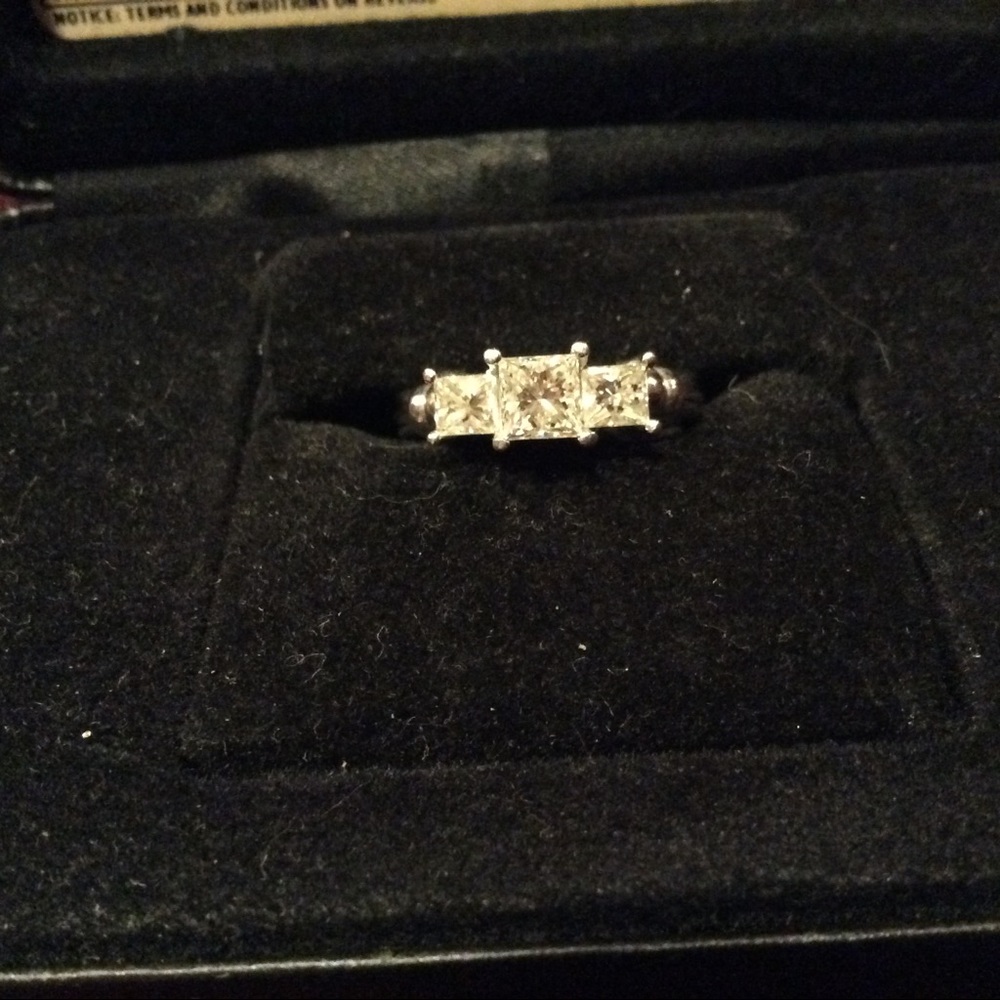 Platinum princess diamond engagement ring.