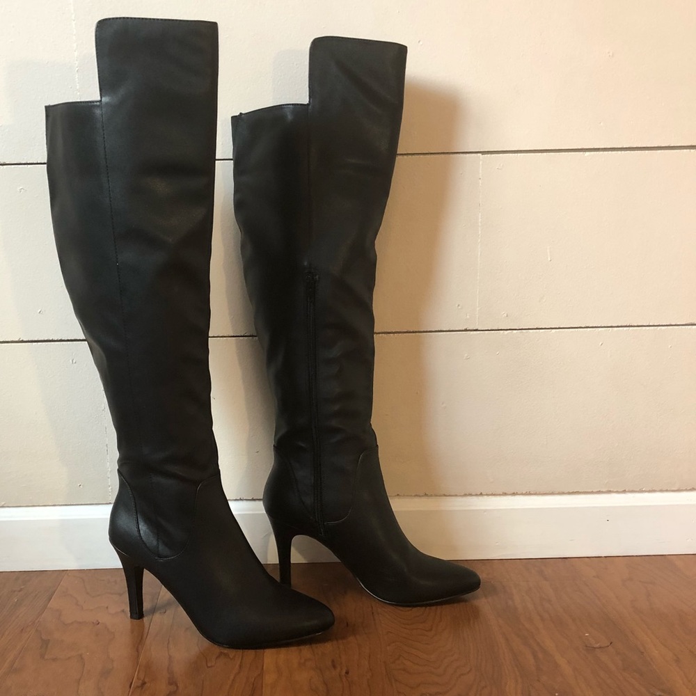 Women’s black over the knee boots.