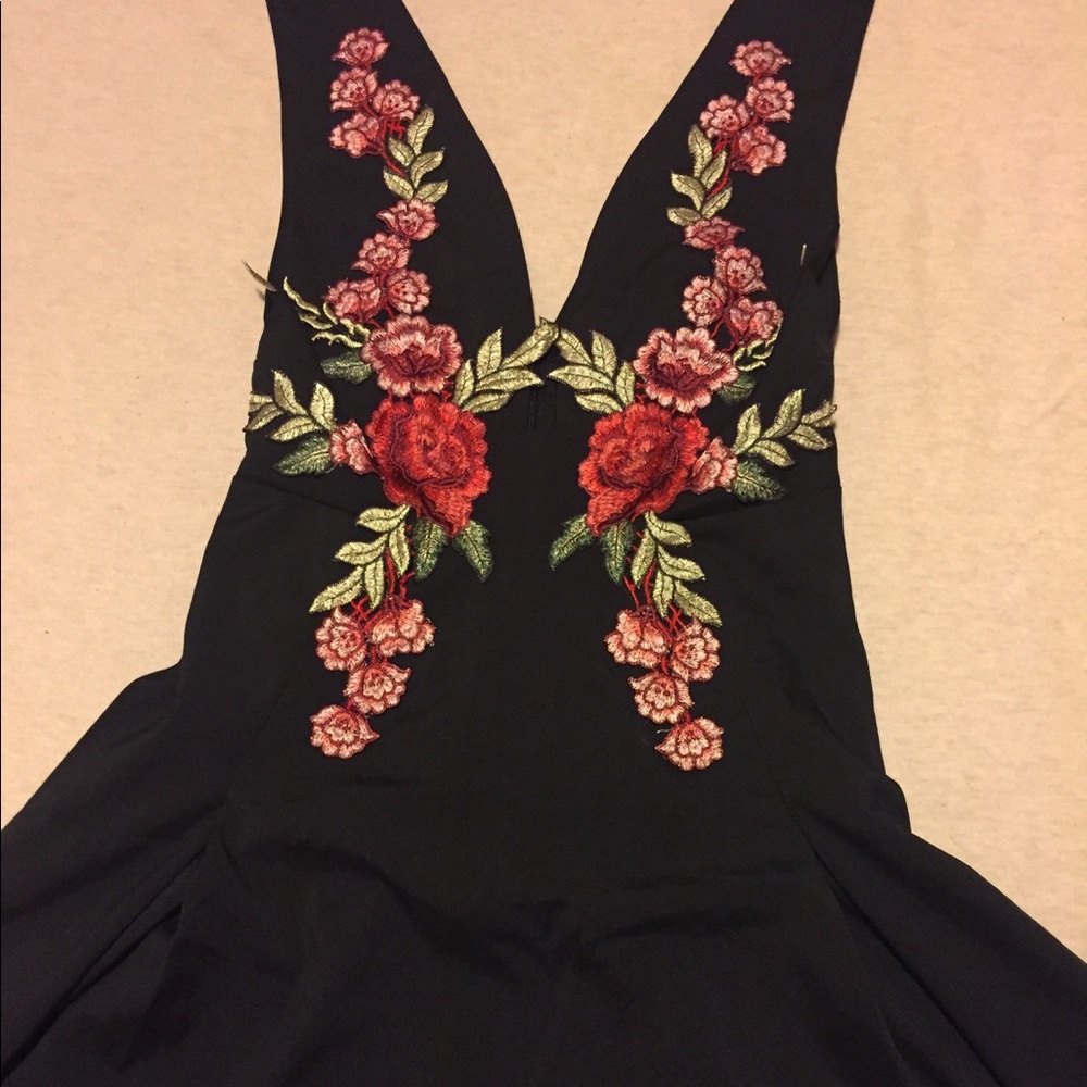 NEW Deep V black mini dress with embroidery.