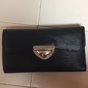Authentic Louis Vuitton Eugenie wallet.