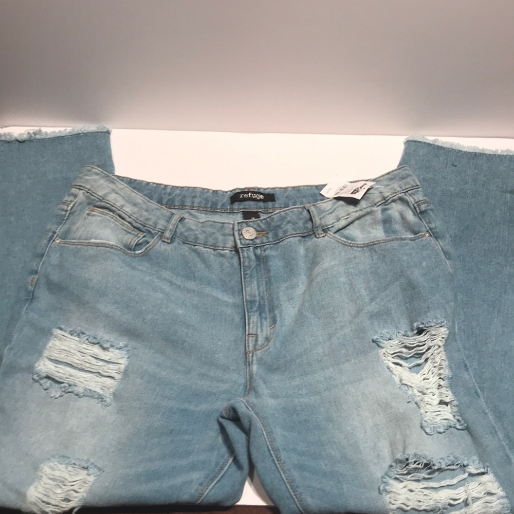 Refuge, Ripped. Fringed at the bottom.