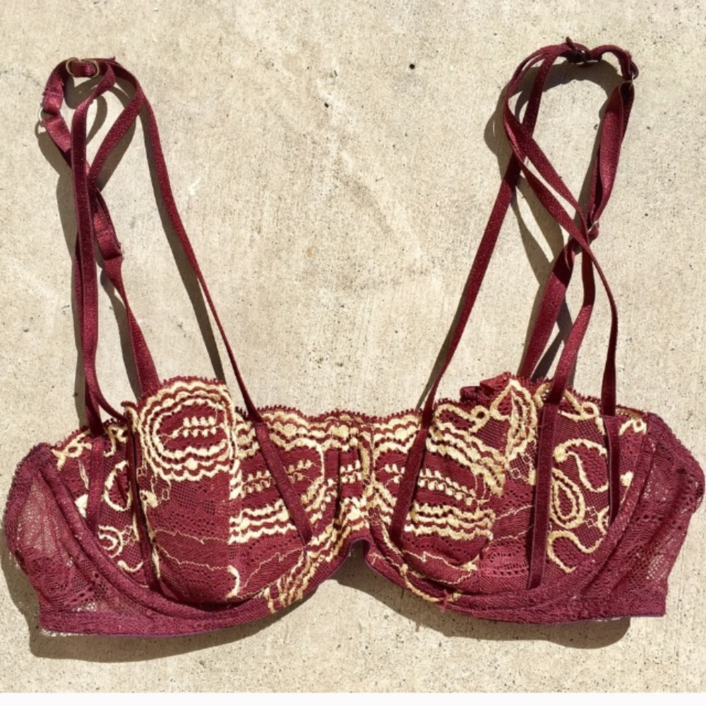 Victoria’s Secret burgundy bra with gold lace