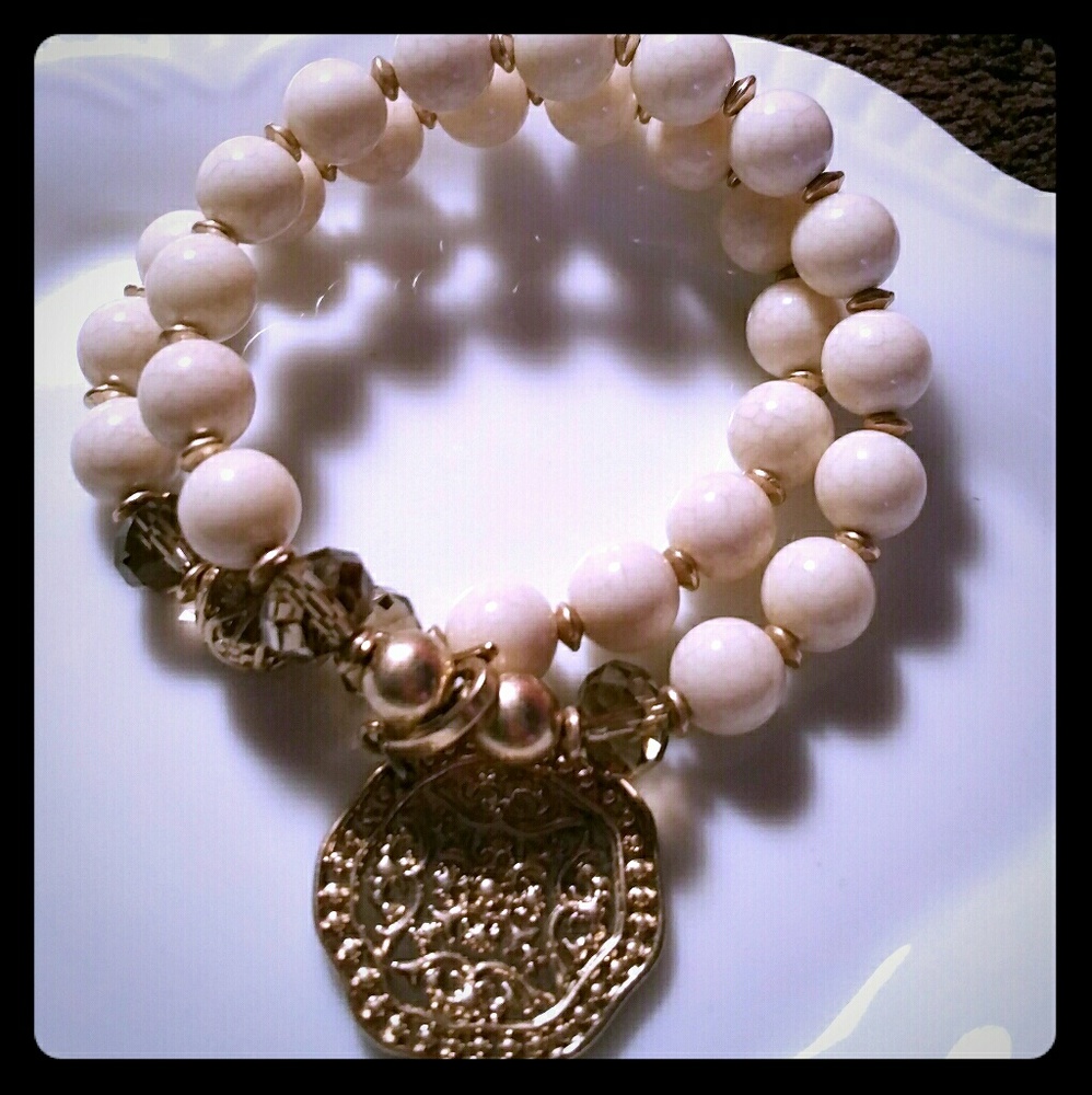 Set of two cream colored premier jewelry bracelets