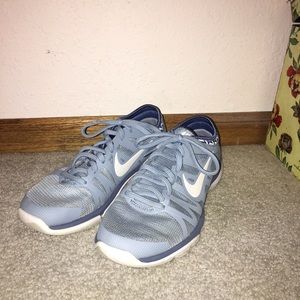 Blue Nike tennis shoes
