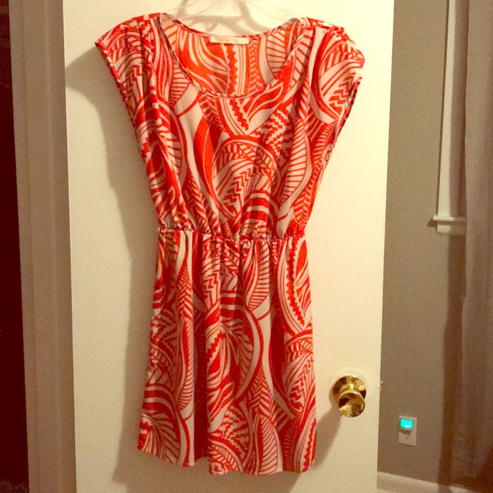 Orange and cream patterned dress