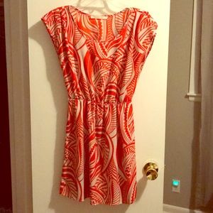 Orange and cream patterned dress