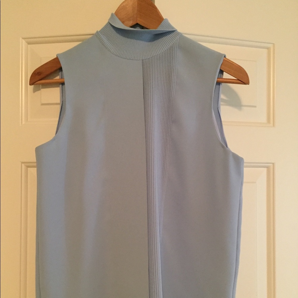 Light blue sleeveless blouse by Vince