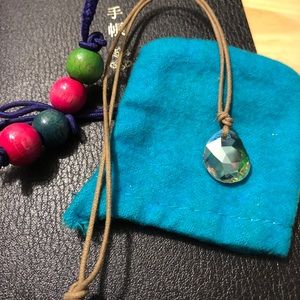 Swarovski crystal pendant on leather cord