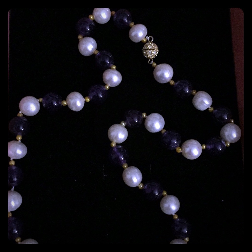 Beautiful 16” pearl necklace with purple beads