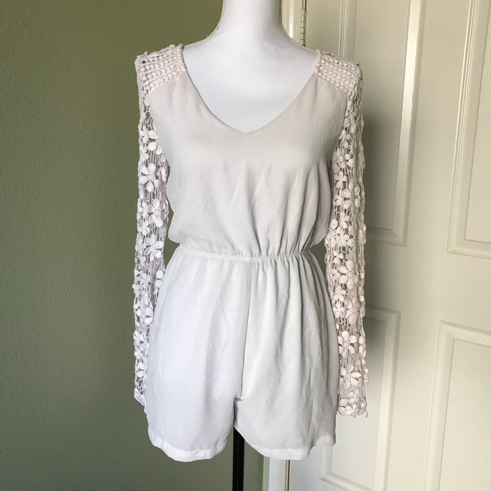 Floral crochet sleeve romper