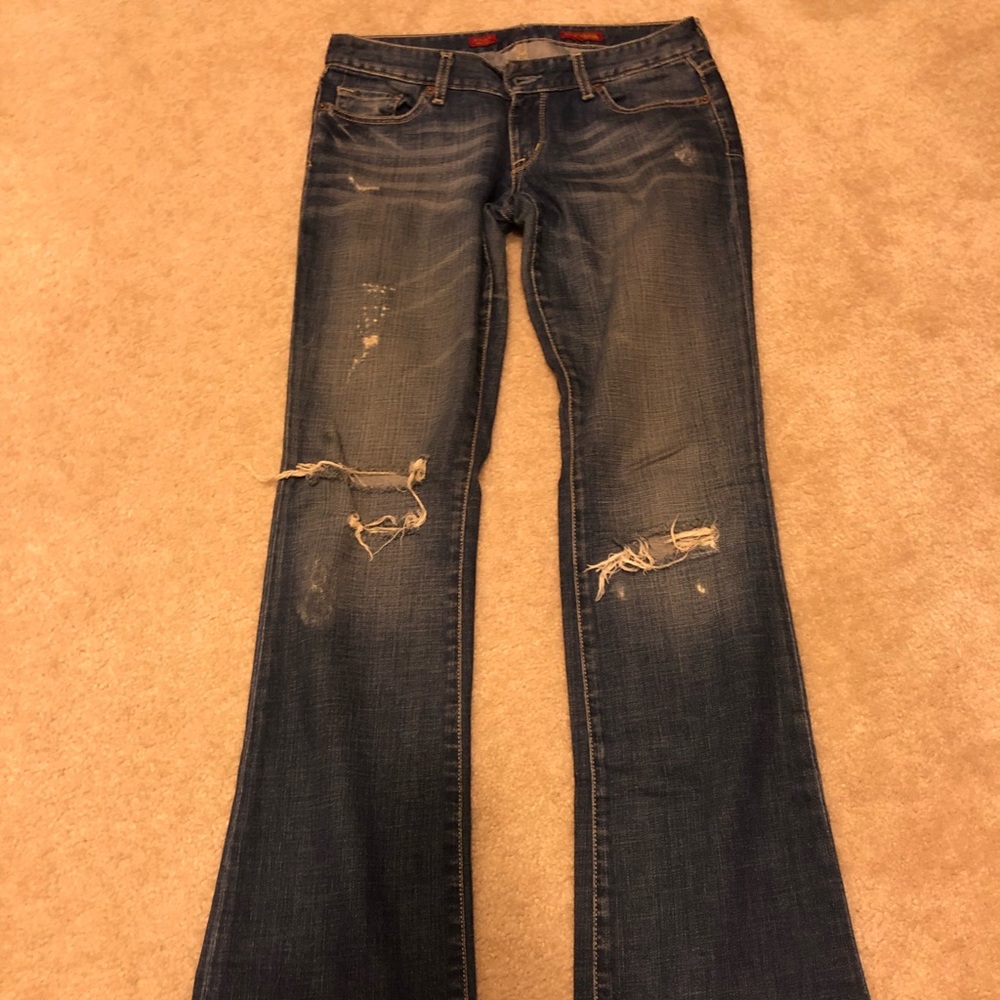 Express Stella bootcut distressed jeans in 4L