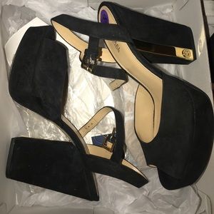 Black suede heels by Michael Kors