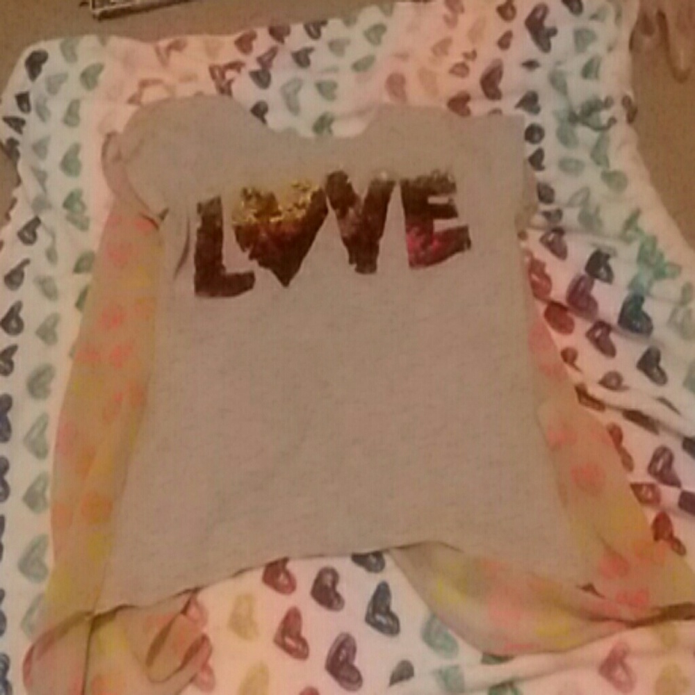 I'm selling a sequined love t-shirt for kids