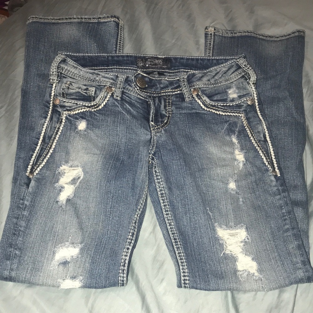 Silver jeans from the buckle