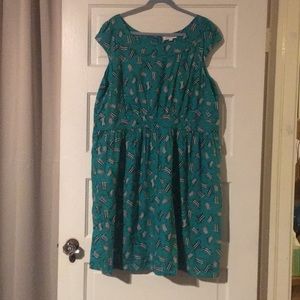 3X Green Dress with Lounge Chairs