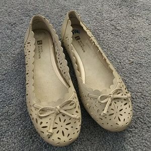 Light gray flats with cutout detail