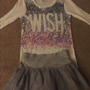 Sequin t-shirt paired with glitter grey skirt
