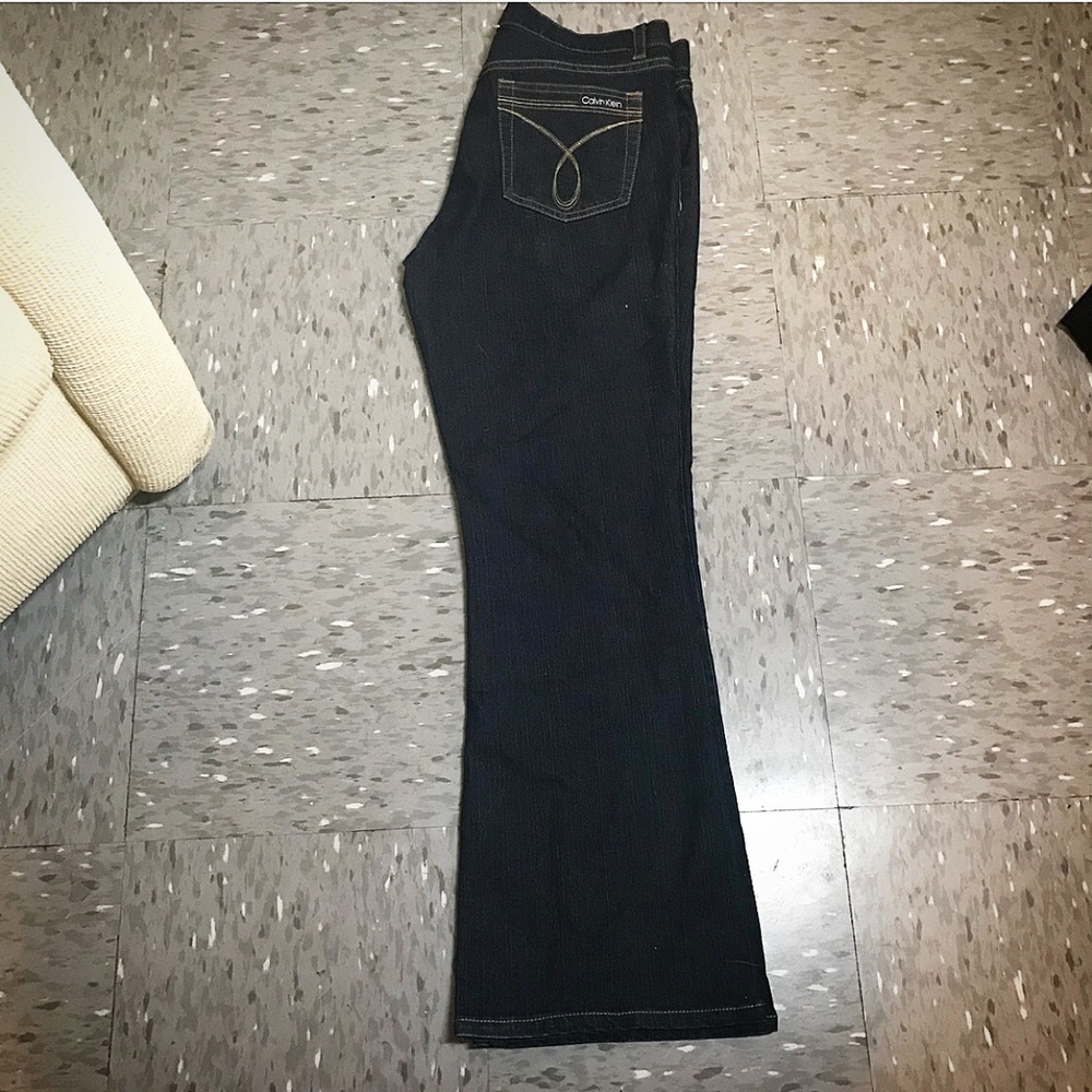 Calvin Klein dark, flare jeans for women.
