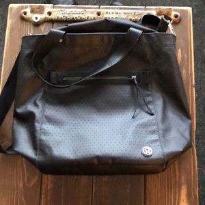 Over the shoulder Lululemon bag.