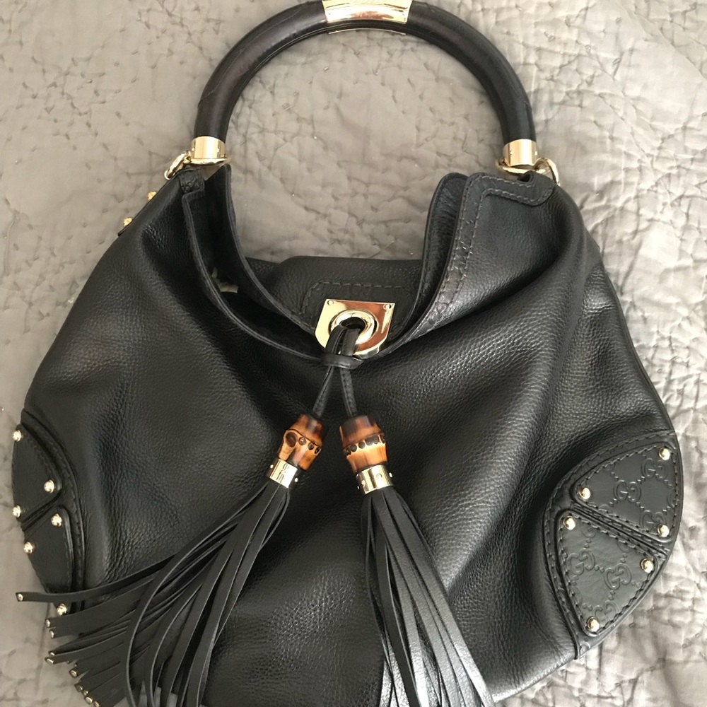 Gucci - authentic indie black leather hobo bag.