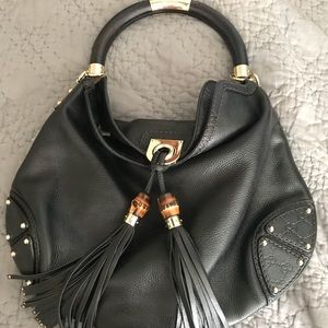 Gucci - authentic indie black leather hobo bag.