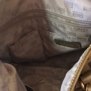 Brown MK purse (price change may be available)