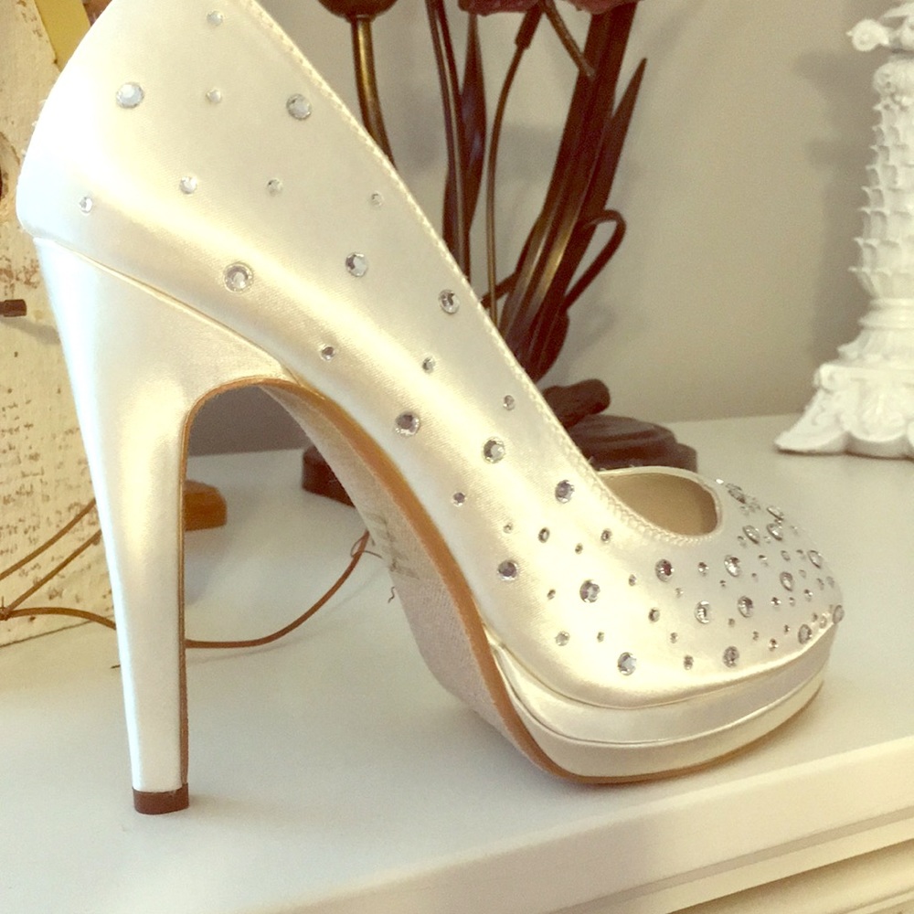 Off white satin rhinestone pumps