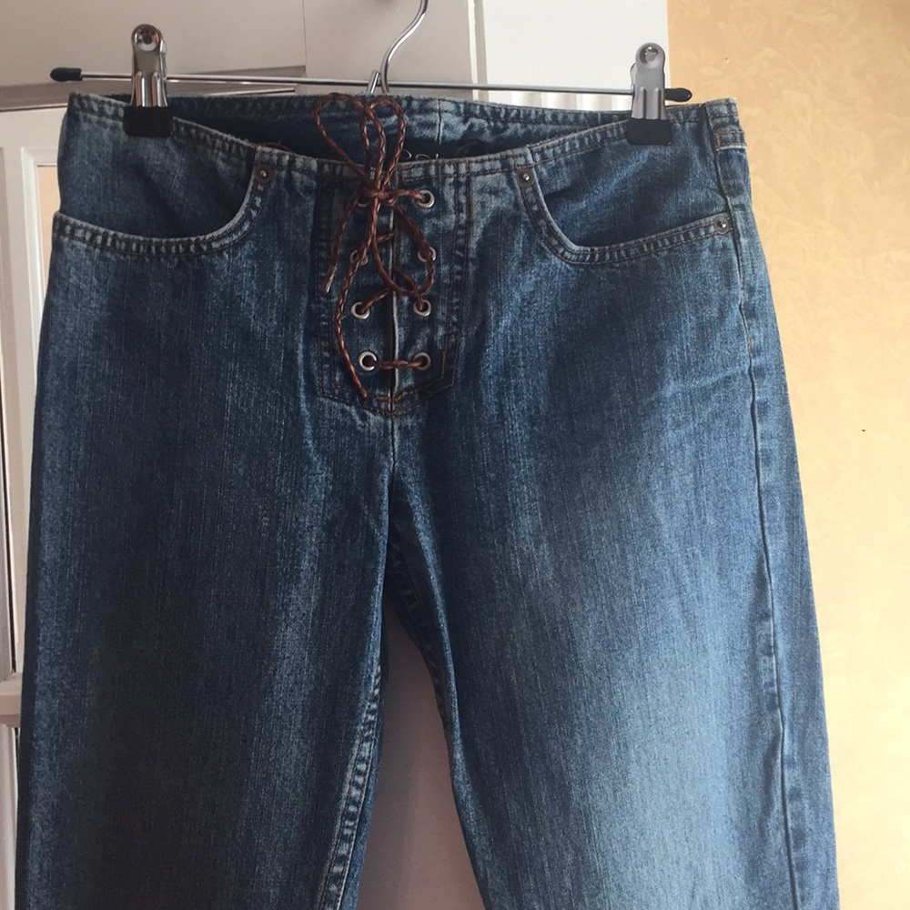 BEBE Lace up jeans size 2