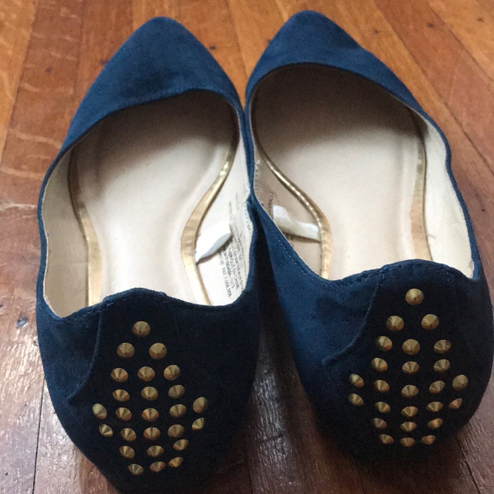 Navy blue flats with studs in the back!
