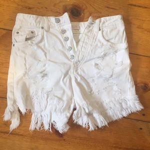White fray bottom ripped jean shorts