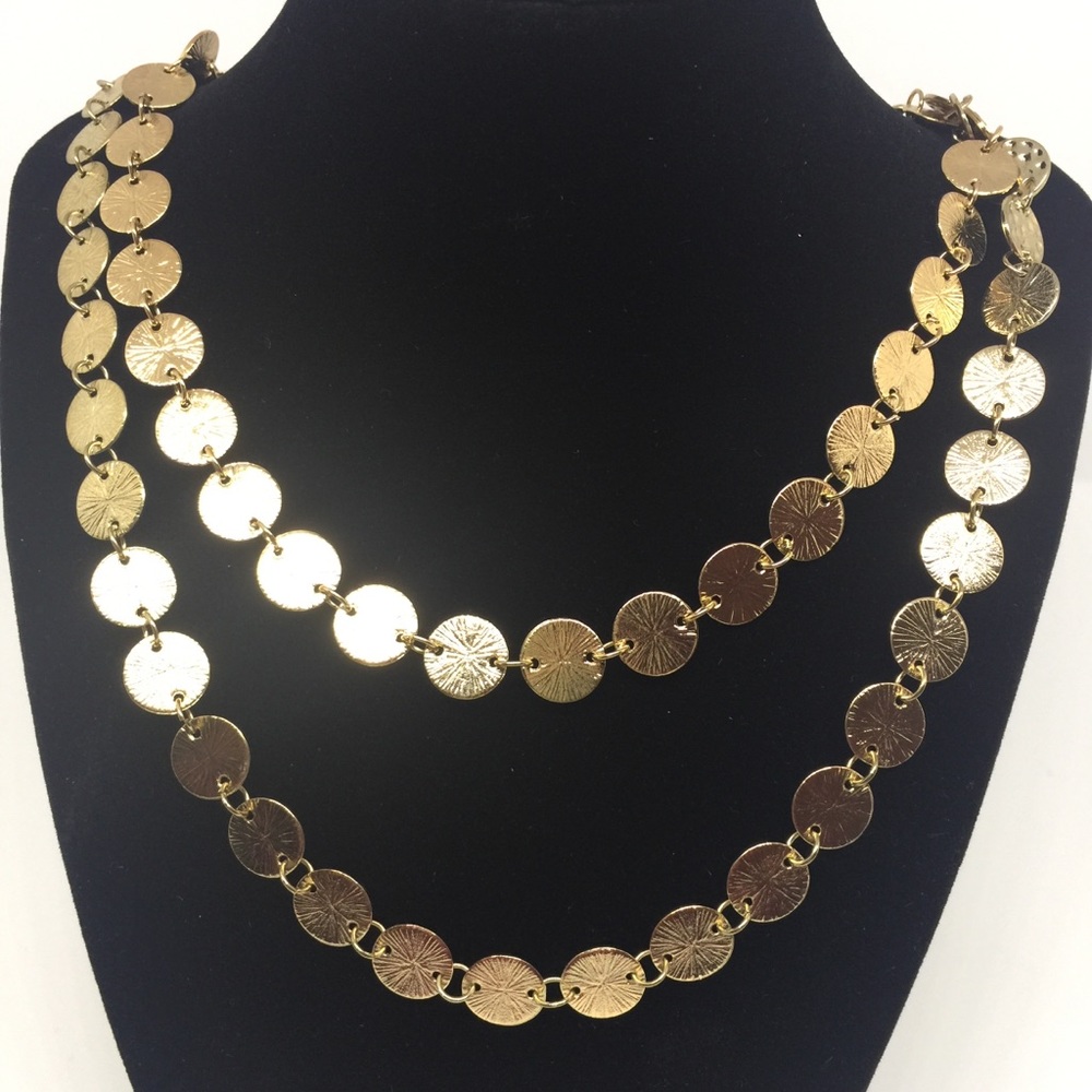Gold costume necklace.