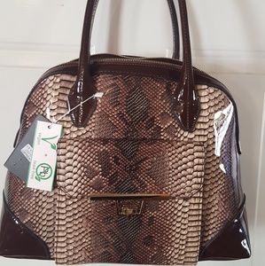 Stylish brown vegan domed satchel.