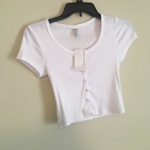 white cropped lounge tee.