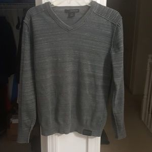 Men's gray v-neck sweater by Calvin Klein