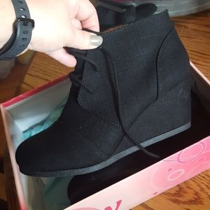 Black wedge booties