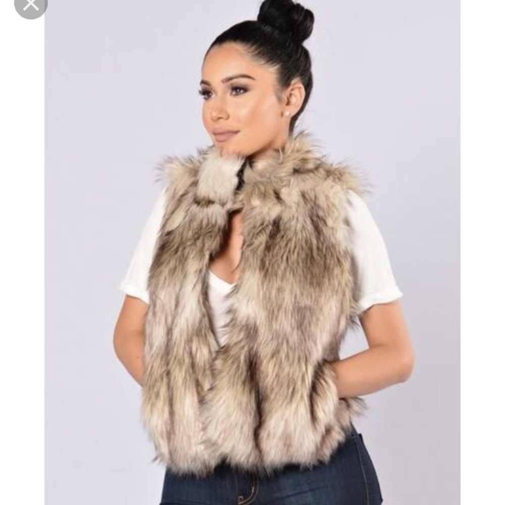 Fur vest . Check out my closet :) bundle and save