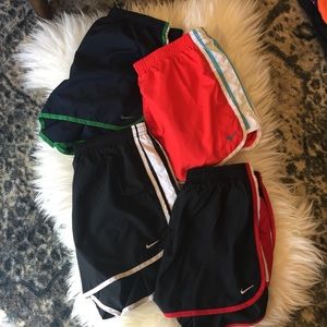 4 pair of Nike running shorts