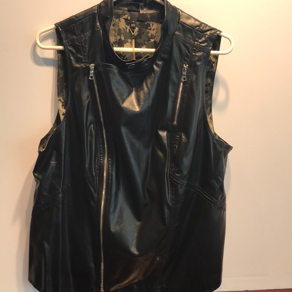 Brand new sleeveless all leather black vest.
