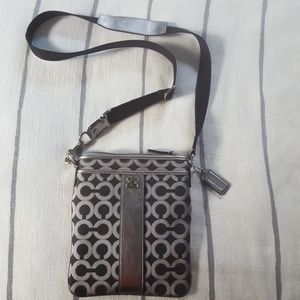 Coach black and silver C crossbody purse