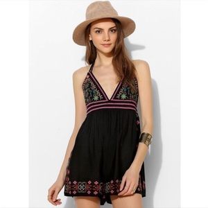 Score lotus embroidered romper