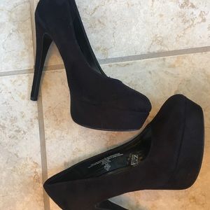 Black platform close toed heels