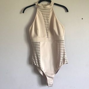 tan body suit