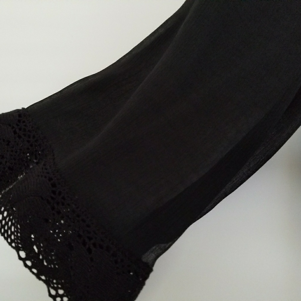 Bandolino mid length bell sleeve blouse.