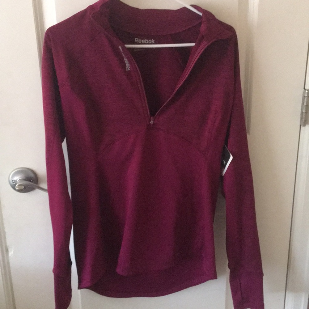New with tags 1/4 zip Reebok pull over
