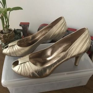 Gold peep toe pumps